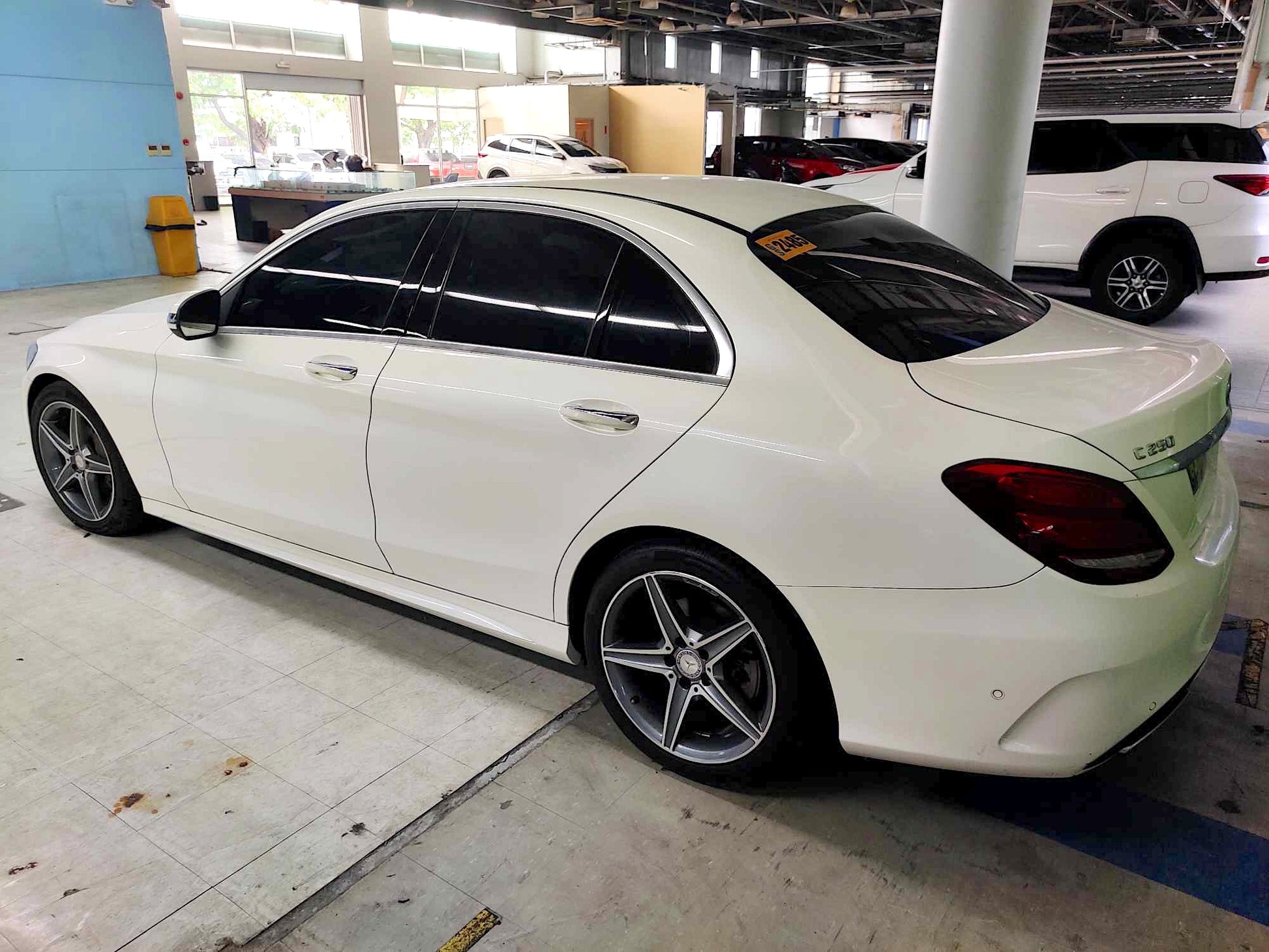 2016 Mercedes Benz C250 AMG A/T Gas with 21T mileage, luxury sedan with AMG styling, available at ROPO